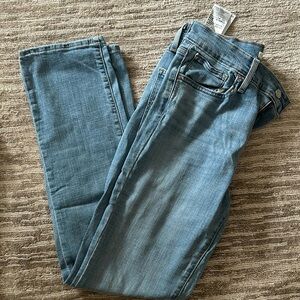 Levi jeans. 724, high rise straight in size 29. Light wash with light distress.